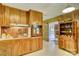 A kitchen with wooden cabinets and classic appliances at 211 Amos Homesley Rd, Cherryville, NC 28021