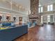 Spacious lobby with stone fireplace, high ceilings, and comfortable seating areas at 2125 Belle Vernon Ave, Charlotte, NC 28210