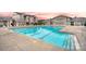 Large community pool with lounge chairs and well-maintained surrounding area at 2125 Belle Vernon Ave, Charlotte, NC 28210
