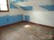Attic with hard wood floors and natural light at 216 N Rowan Ave, Spencer, NC 28159