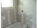 Bathroom with a new tub and window at 216 N Rowan Ave, Spencer, NC 28159