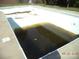 In-ground pool needing cleaning and repairs, ready for restoration and summer enjoyment at 216 N Rowan Ave, Spencer, NC 28159