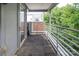Modern balcony with grey railing and dark flooring, offering great outdoor space at 226 Magnolia Ave, Charlotte, NC 28203