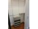 Walk-in closet with wood floors and shelving at 226 Magnolia Ave, Charlotte, NC 28203
