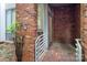 Townhouse entrance with brick facade, modern railings, and address number clearly displayed at 226 Magnolia Ave, Charlotte, NC 28203