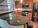 Updated kitchen featuring stainless steel appliances and granite countertops at 226 Magnolia Ave, Charlotte, NC 28203