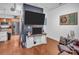 Stylish living room connected to a kitchen with hardwood flooring and modern decor at 226 Magnolia Ave, Charlotte, NC 28203