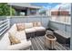 Stylish rooftop deck with plush seating, fire pit, and sleek outdoor furniture, perfect for relaxing at 226 Magnolia Ave, Charlotte, NC 28203