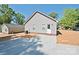 Back of the house showing gray vinyl siding, a concrete patio, and a well-manicured backyard at 2506 Glendale Ave, Kannapolis, NC 28081