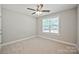 Cozy bedroom features neutral carpet and ample natural light at 2506 Glendale Ave, Kannapolis, NC 28081