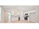 Open kitchen featuring white cabinets and stainless steel appliances at 2506 Glendale Ave, Kannapolis, NC 28081