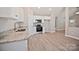 Open kitchen featuring white cabinets and stainless steel appliances at 2506 Glendale Ave, Kannapolis, NC 28081