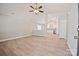 Bright and airy living room featuring laminate flooring and an open floor plan to the kitchen at 2506 Glendale Ave, Kannapolis, NC 28081