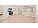 Open living space featuring white cabinets and stainless steel appliances at 2506 Glendale Ave, Kannapolis, NC 28081