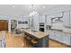 Well-equipped kitchen featuring granite countertops, an island with seating, and modern appliances at 2617 Bay St, Charlotte, NC 28205