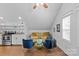 Open living room/kitchen combo with modern furniture and stainless steel appliances at 2617 Bay St, Charlotte, NC 28205