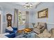 Bright living room with stylish decor, large windows, and beautiful hardwood floors at 2617 Bay St, Charlotte, NC 28205