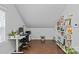 Home office space with a desk, chair, shelving unit, and a window at 2617 Bay St, Charlotte, NC 28205