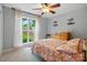 Bedroom with a window and a ceiling fan at 2745 Stockwood Dr, Gastonia, NC 28056