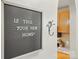Charming sign with the words: Is This Your New Home? hanging on a gray wall at 2745 Stockwood Dr, Gastonia, NC 28056
