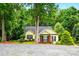 Charming home nestled amidst lush greenery with a well-maintained front yard at 2745 Stockwood Dr, Gastonia, NC 28056