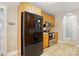 Kitchen showcasing stainless steel appliances, light cabinets, and tiled flooring at 2745 Stockwood Dr, Gastonia, NC 28056