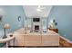 Bright living room featuring vaulted ceiling, fireplace, and comfortable seating arrangement at 2745 Stockwood Dr, Gastonia, NC 28056