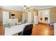 Expansive living room with wood floors, a built-in entertainment center, and modern furnishings at 2745 Stockwood Dr, Gastonia, NC 28056