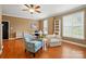 Comfortable living room with hardwood floors, ample lighting, and decorative seating at 2745 Stockwood Dr, Gastonia, NC 28056