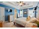 This main bedroom has a ceiling fan, carpet, and a walk in closet at 2745 Stockwood Dr, Gastonia, NC 28056