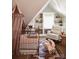 Delightful Bedroom with charming details, including a crib, rocking chair, and built-in shelves at 290 Union S St, Concord, NC 28025