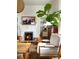 Comfortable living area featuring a fireplace, classic artwork, and natural light, ideal for relaxation at 290 Union S St, Concord, NC 28025