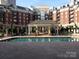 Resort-style pool with a gazebo and seating area in an upscale condominium complex at 300 W 5Th St # 404, Charlotte, NC 28202