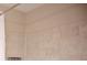 Close up of tiled shower and bathtub in bathroom, featuring neutral colored tiles at 300 W 5Th St # 404, Charlotte, NC 28202