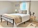 Bright bedroom with a comfortable bed, soft lighting, and minimalist decor at 3154 Loomis St, Lincolnton, NC 28092