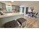 Open-concept kitchen with bar seating and stainless steel appliances, ideal for entertaining at 3154 Loomis St, Lincolnton, NC 28092