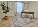Bright office featuring wood desk, hardwood floors, and accent rug at 3154 Loomis St, Lincolnton, NC 28092