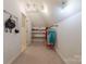 Finished attic space provides extra storage and organization and a small closet for dress up at 3304 Danhill Pl, Matthews, NC 28105
