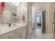 Bathroom with a vanity, with a view of a bedroom at 3304 Danhill Pl, Matthews, NC 28105