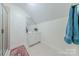 Comfortable bathroom with a tile floor, shower and vanity with white cabinets offers a relaxing atmosphere at 3304 Danhill Pl, Matthews, NC 28105