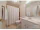 Bathroom featuring a shower/tub combo and a single sink vanity at 3304 Danhill Pl, Matthews, NC 28105