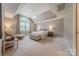 Spacious bedroom with trey ceiling, fan, and lots of natural light at 3304 Danhill Pl, Matthews, NC 28105