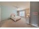 Bedroom features a soft color palette, plush carpet, and a bright window at 3304 Danhill Pl, Matthews, NC 28105