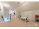 Bright bonus room offers ample space, neutral colors, and a play area with a table at 3304 Danhill Pl, Matthews, NC 28105