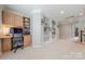 Spacious home office featuring built-in bookshelves, wood accents, and a comfortable workspace at 3304 Danhill Pl, Matthews, NC 28105