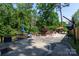 Backyard featuring a concrete patio, outdoor seating, and a grill at 3307 Draper Ave, Charlotte, NC 28205