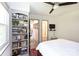 Bedroom featuring a bookshelf and an ensuite bathroom, creating a private retreat at 3307 Draper Ave, Charlotte, NC 28205