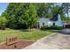 Charming home with a well-manicured front yard and driveway at 3307 Draper Ave, Charlotte, NC 28205