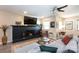 Stylish living room with a black fireplace, modern furniture, and ample natural light at 3307 Draper Ave, Charlotte, NC 28205