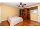 Bedroom with ceiling fan, large bookcase, and a bright window at 3310 46Th Ne Ave, Hickory, NC 28601